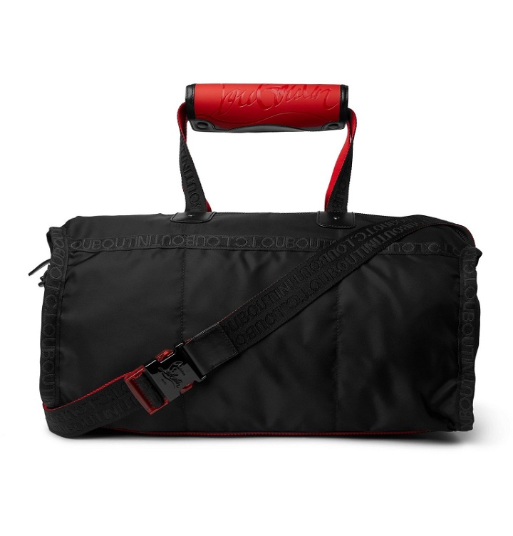 Photo: Christian Louboutin - Leather-Trimmed Shell Holdall - Black
