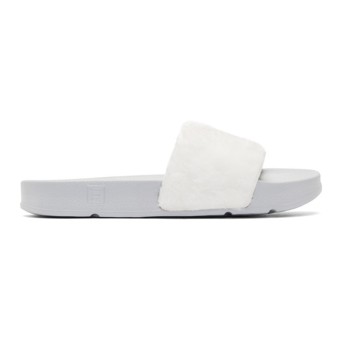 Photo: Baja East White and Grey Fila Edition Shearling Drifter Slides