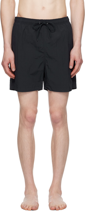 Photo: NORSE PROJECTS Navy Hauge Recycled Nylon Swim Shorts