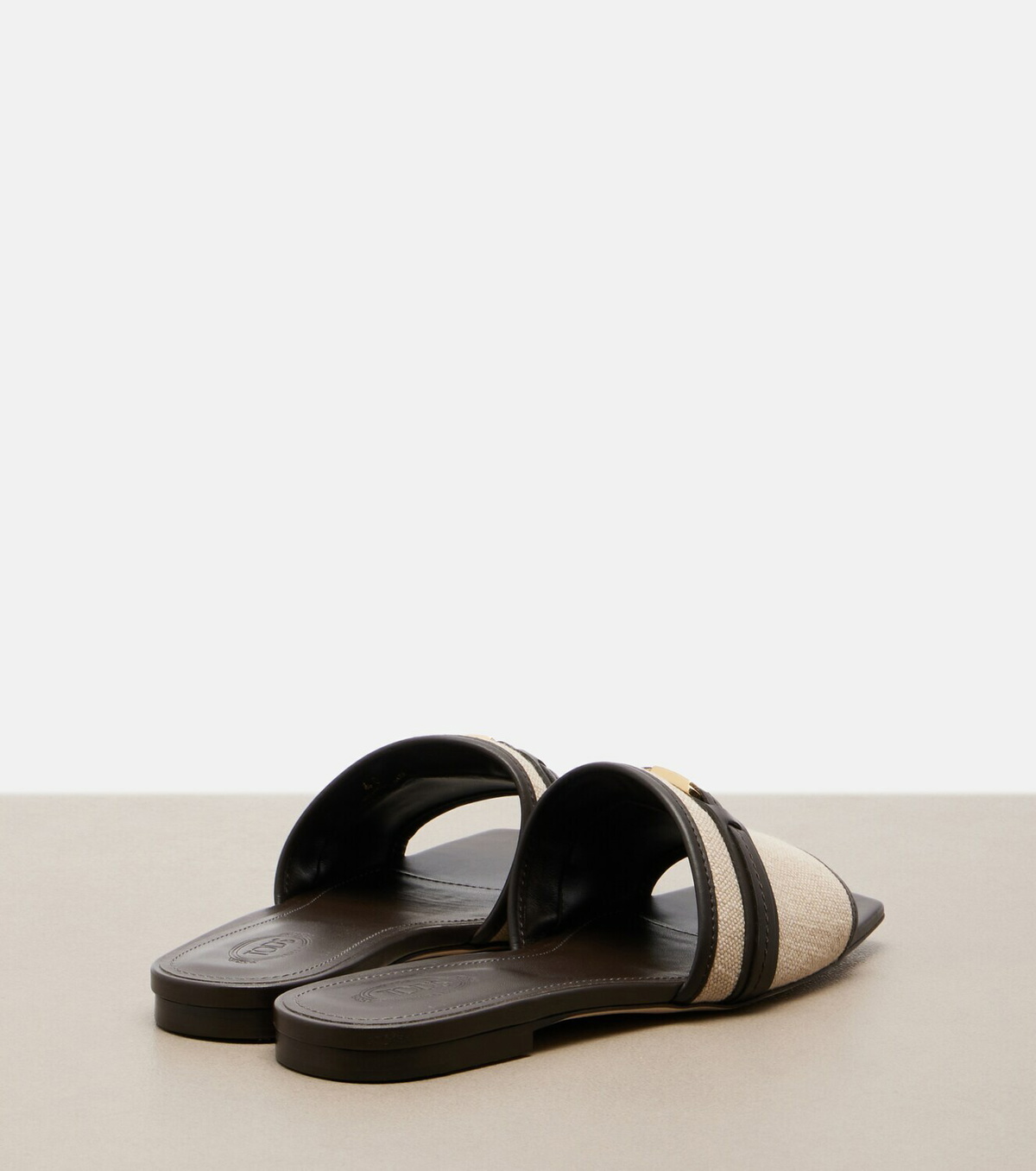 Tod's Leather-trimmed raffia slides