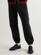 GUCCI - Tapered Logo-Print Cotton-Jersey Sweatpants - Black