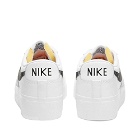Nike Blazer Low Platform W Sneakers in White/Black/Sail/Orange