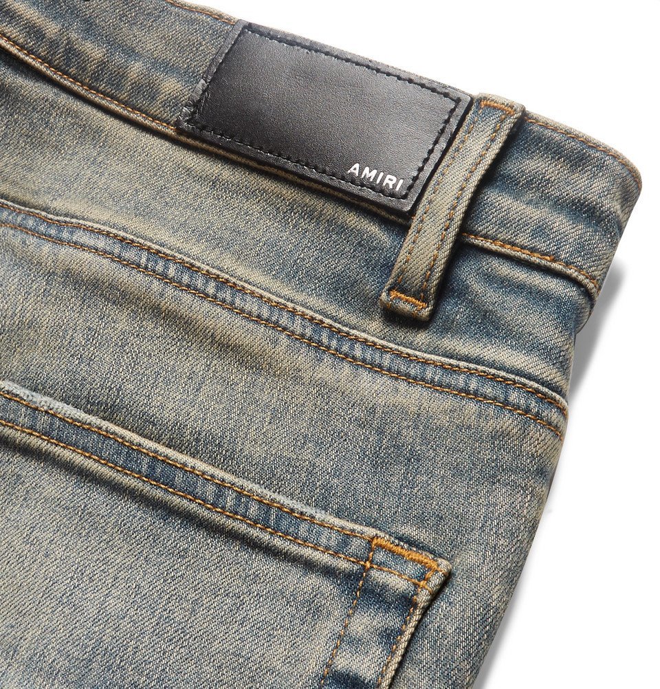 AMIRI - MX1 Skinny-Fit Rib-Panelled Distressed Stretch-Denim Jeans - Men - Blue