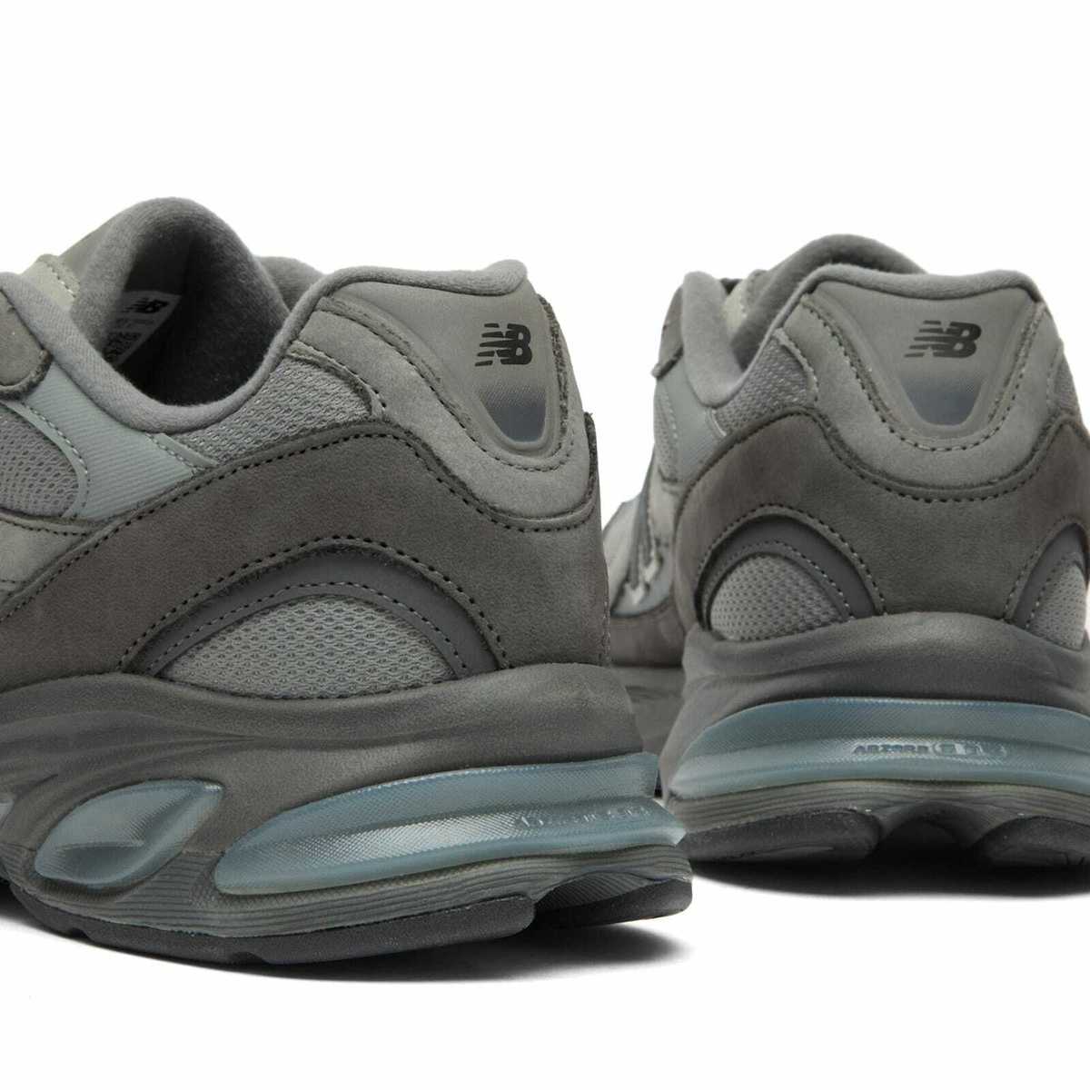 Comme des Garçons Homme Men's x New Balance 2010V Sneakers in Grey