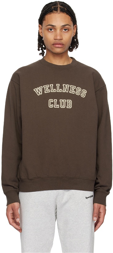 Photo: Sporty & Rich Brown 'Wellness Club' Sweatshirt