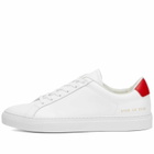 Woman by Common Projects Women's Retro Low Sneakers in White/Red