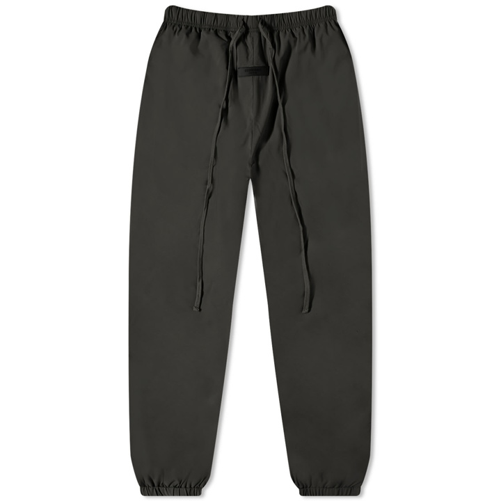 Photo: Fear of God ESSENTIALS Men's Nylon Track Pant in Off-Black