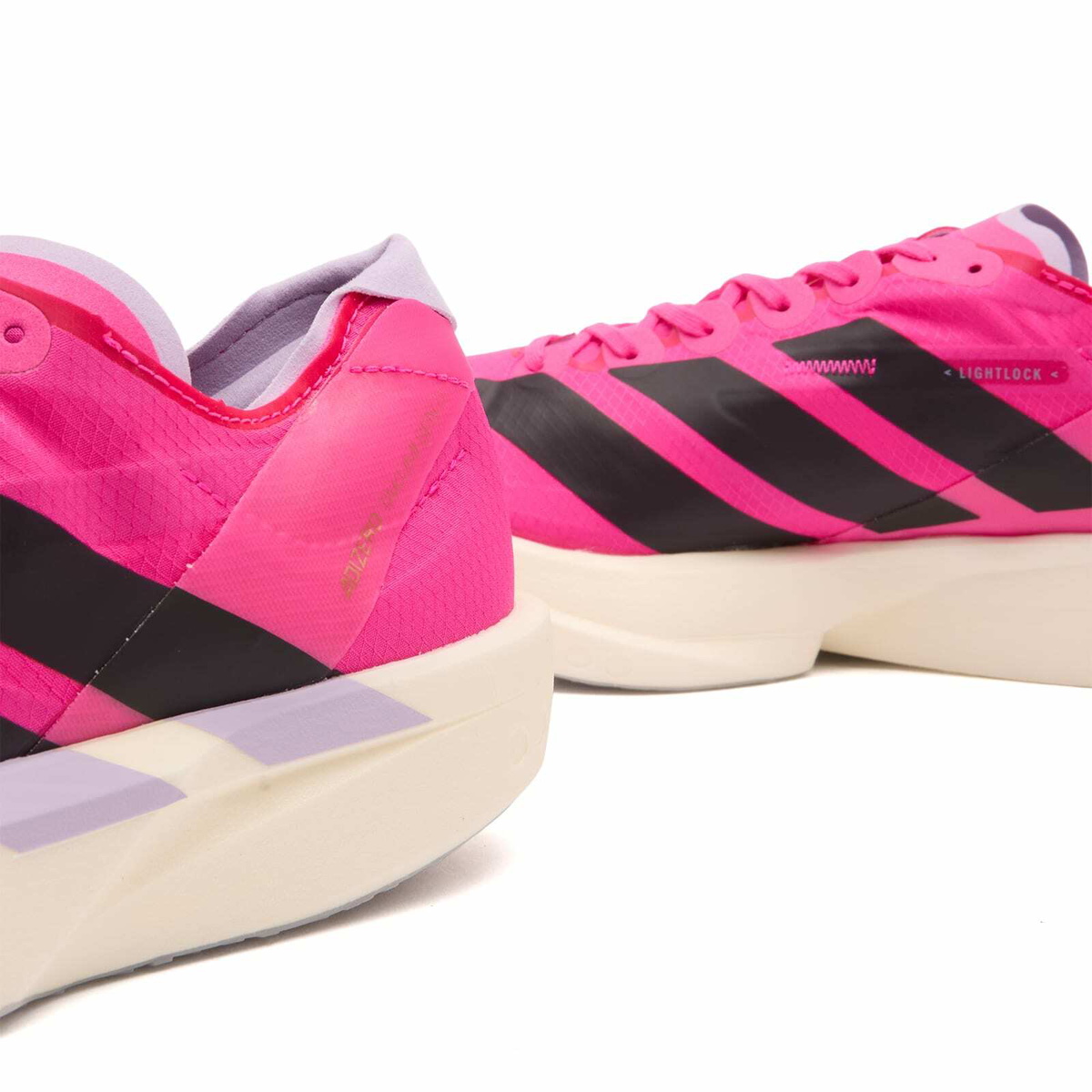 Adidas Adizero Takumi Sen 11 Sneaker in Shock Pink/Aurora Black/Powder Plum