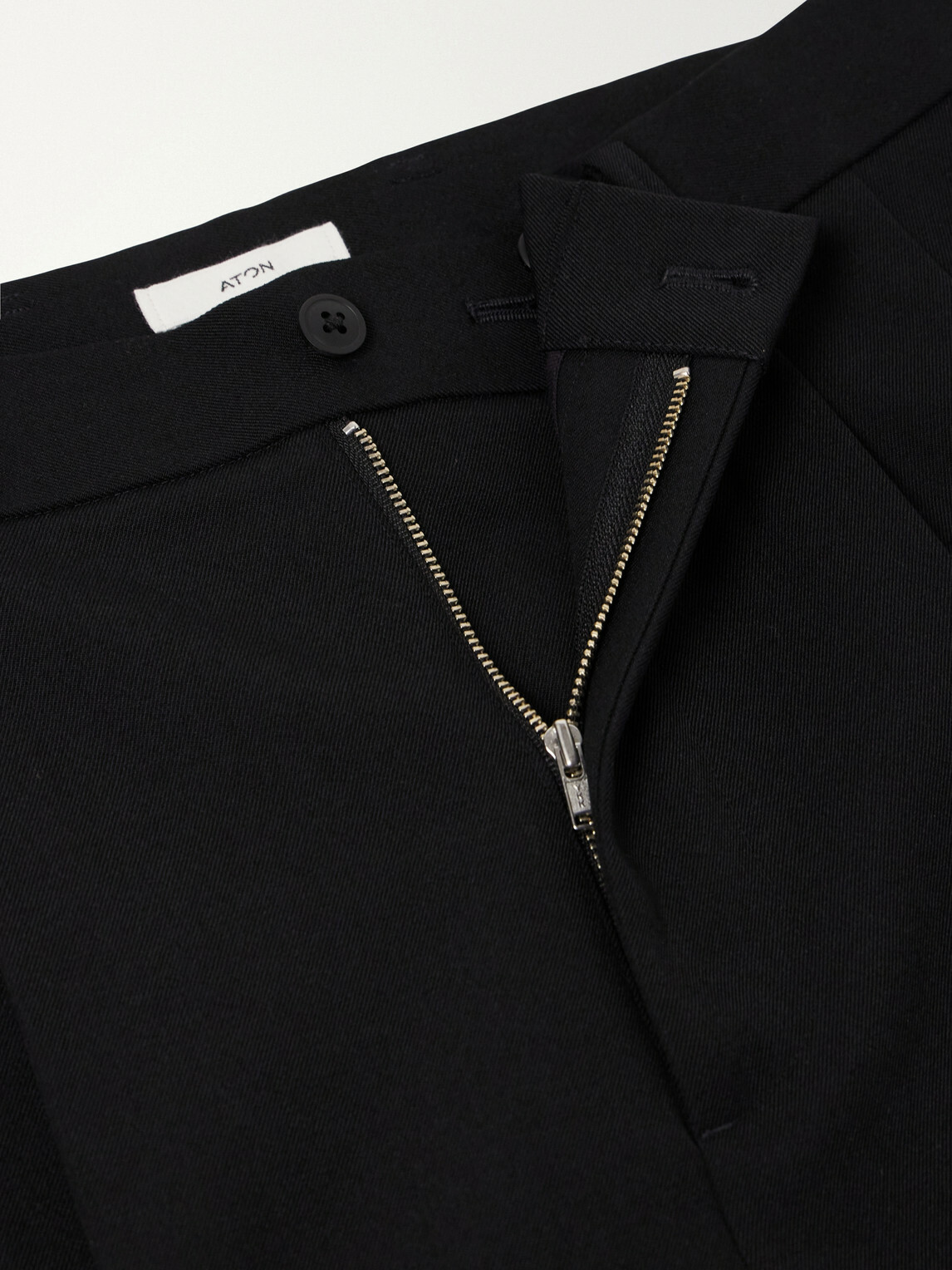 ATON - Pleated Tapered Wool-Twill Suit Trousers - Black