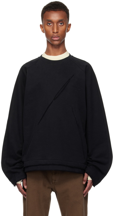 Photo: NULLUS SSENSE Exclusive Black Diagonal Slit Sweatshirt