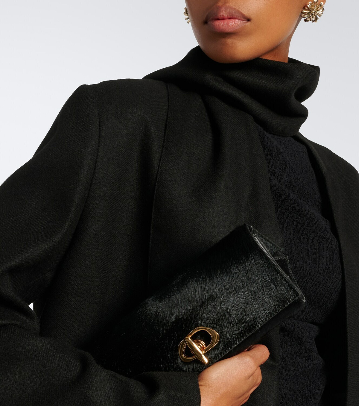 Amanu Tanzania calf hair clutch