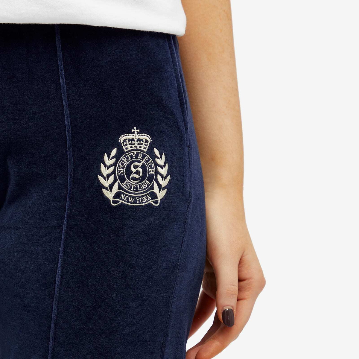 Sporty & Rich Women's NY Crest Velour Track Pants in Navy Cream