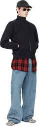 VETEMENTS Blue Passport Stamps Jeans