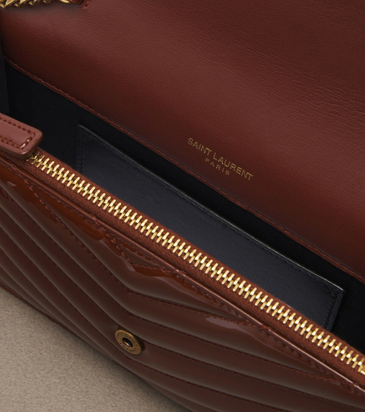 Saint Laurent Cassandre matelassé leather wallet on chain