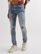 AMIRI - Skinny-Fit Leather-Trimmed Distressed Jeans - Blue