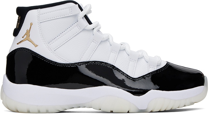Photo: Nike Jordan White & Black Air Jordan 11 Retro Sneakers