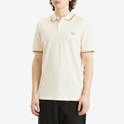 Comme des Garçons SHIRT Men's x Fred Perry Polo Shirt in Peach