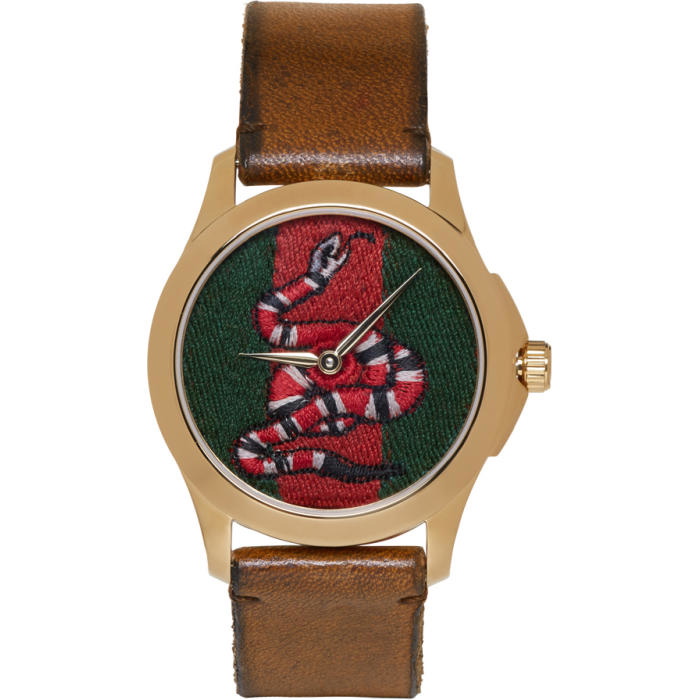 Photo: Gucci Gold Medium G-Timeless Snake Watch