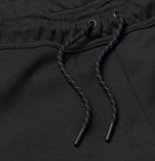 Nike - Sportswear Tapered Logo-Print Cotton-Blend Tech-Fleece Sweatpants - Black