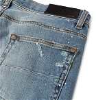 AMIRI - Skinny-Fit Appliquéd Distressed Stretch-Denim Jeans - Light blue