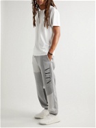 Valentino - Tapered Patchwork Logo-Print Cotton-Blend Jersey Sweatpants - Gray