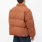 F/CE. x Digawell Puffer Jacket in Orange