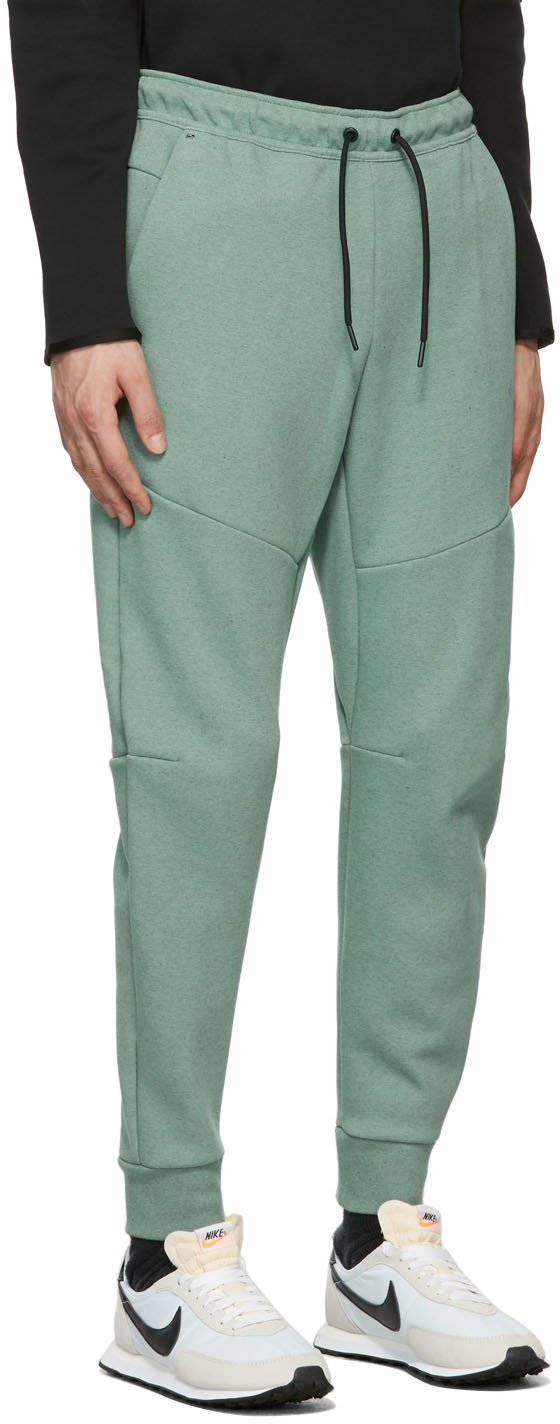 Green nike tech pants hot sale