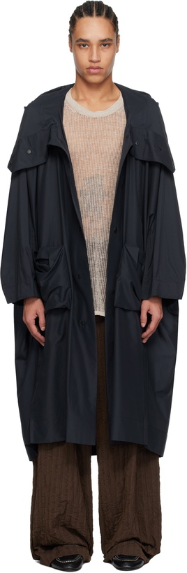 Photo: HOMME PLISSÉ ISSEY MIYAKE Navy Kite Coat