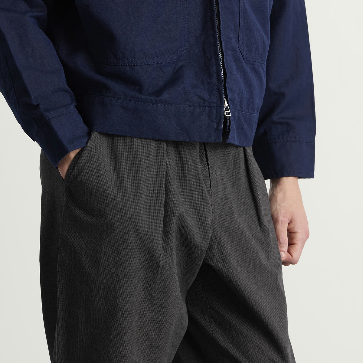 Universal Works Men's Seattle Cotton Pleated Track Pant in Charcoal