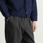 Universal Works Men's Seattle Cotton Pleated Track Pant in Charcoal