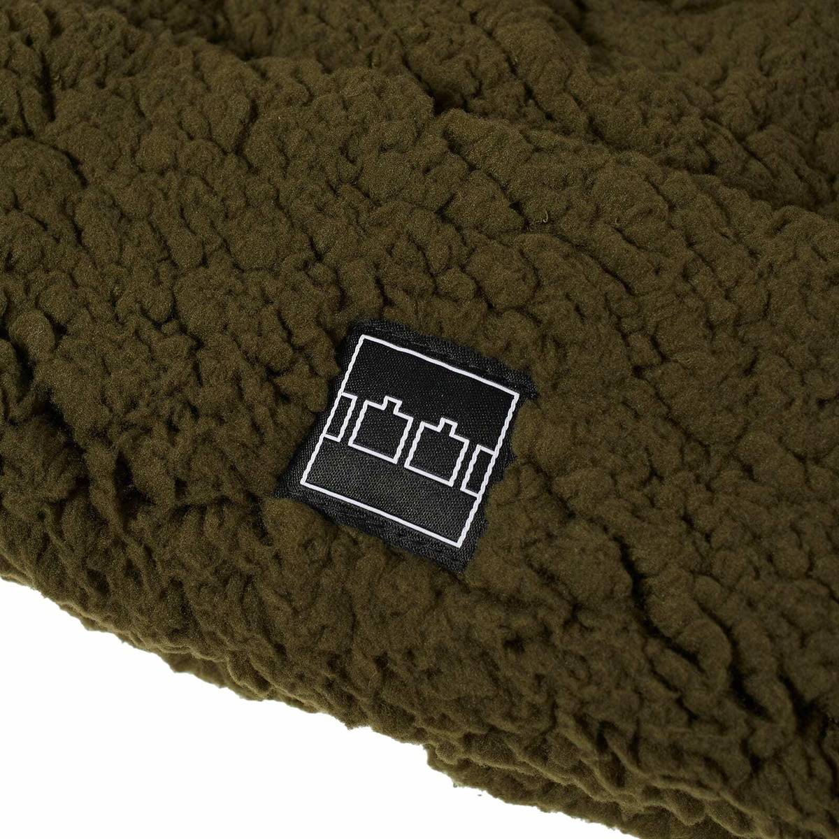 The Trilogy Tapes Men's TTT Fleece Beanie in Olive