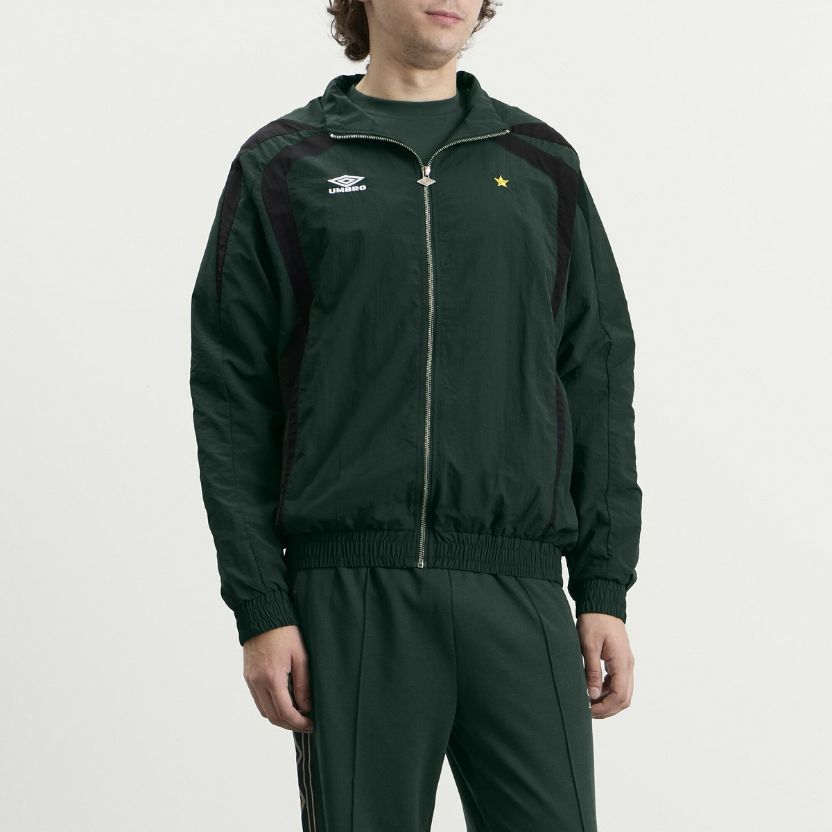 Umbro Men's Relaxed Track Jacket in Pine Grove/Black