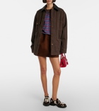 Prada Chocolate cow-print calf hair loafers