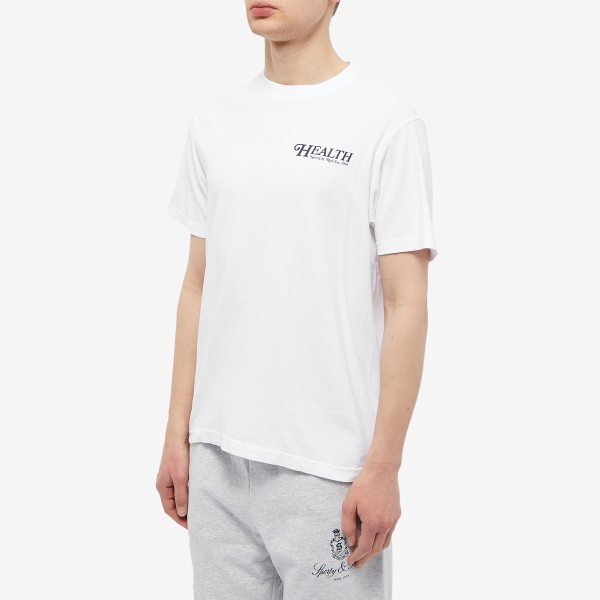 Tシャツ・カットソー Sporty & Rich Men's 70s Health T-Shirt White TS833WH Sporty & Rich Men's 70s Health T-Shirt White/Navy | TS833WH