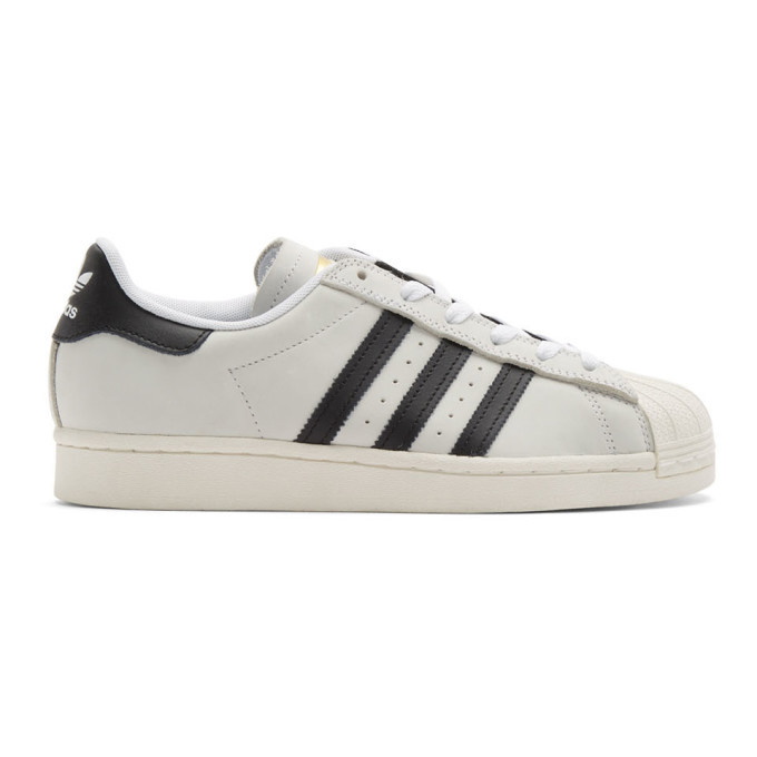 Photo: adidas Originals White and Black Superstar Sneakers