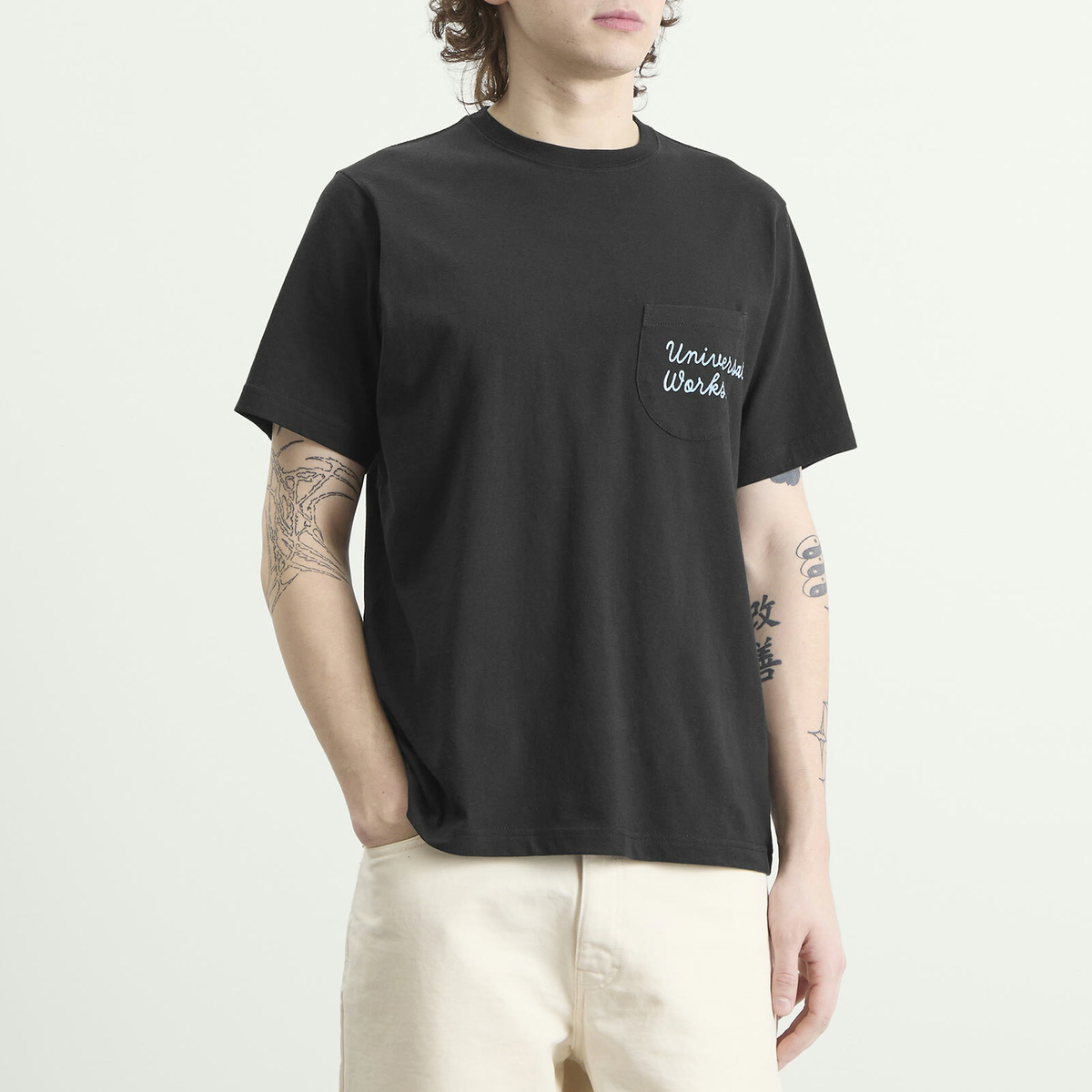 Universal Works Men's Script Logo Pocket T-shirt in Black