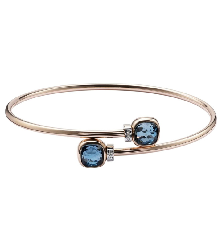 Photo: Pomellato Nudo 18kt gold bangle with topazes and diamonds