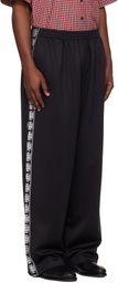 VETEMENTS Black Biker Cross Tape Track Pants