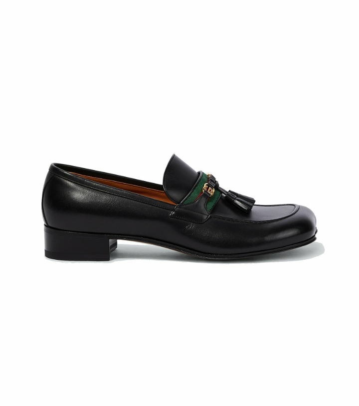 Photo: Gucci - Interlocking G tassel leather loafers
