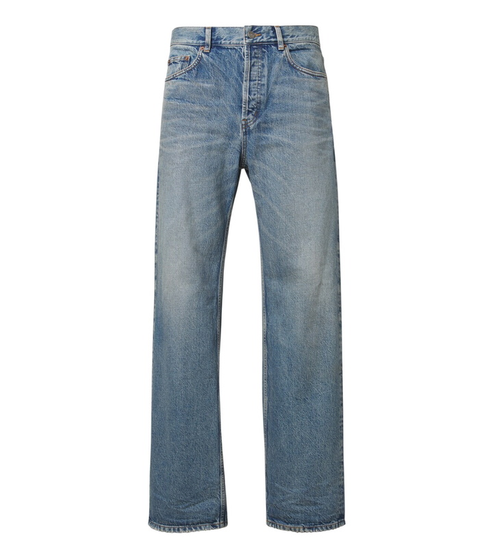 Photo: Saint Laurent Faded wide-leg jeans