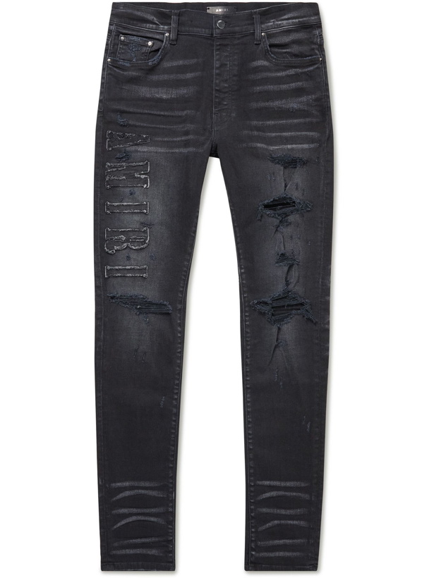 Photo: AMIRI - Skinny-Fit Logo-Appliquéd Distressed Jeans - Black