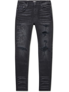 AMIRI - Skinny-Fit Logo-Appliquéd Distressed Jeans - Black