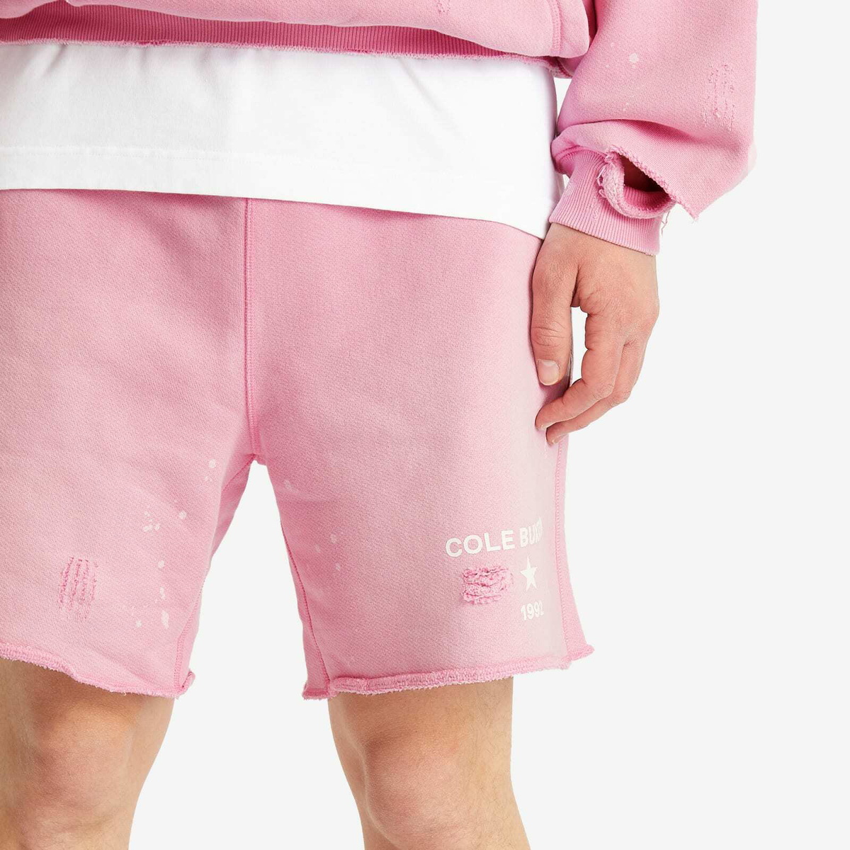 Cole Buxton Men's 1992 Distressed Shorts in Washed Pink
