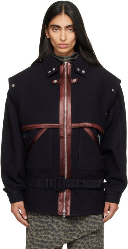 Photo: Kiko Kostadinov Navy Heron Belted Jacket