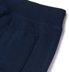 Polo Ralph Lauren - Tapered Appliquéd Fleece-Back Cotton-Blend Jersey Sweatpants - Men - Navy