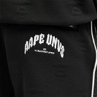 Men's AAPE Dope Jacquard Moonface Monogram Track Pants in Black