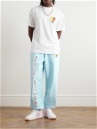 SKY HIGH FARM - Tapered Logo-Print Organic Cotton-Jersey Sweatpants - Blue