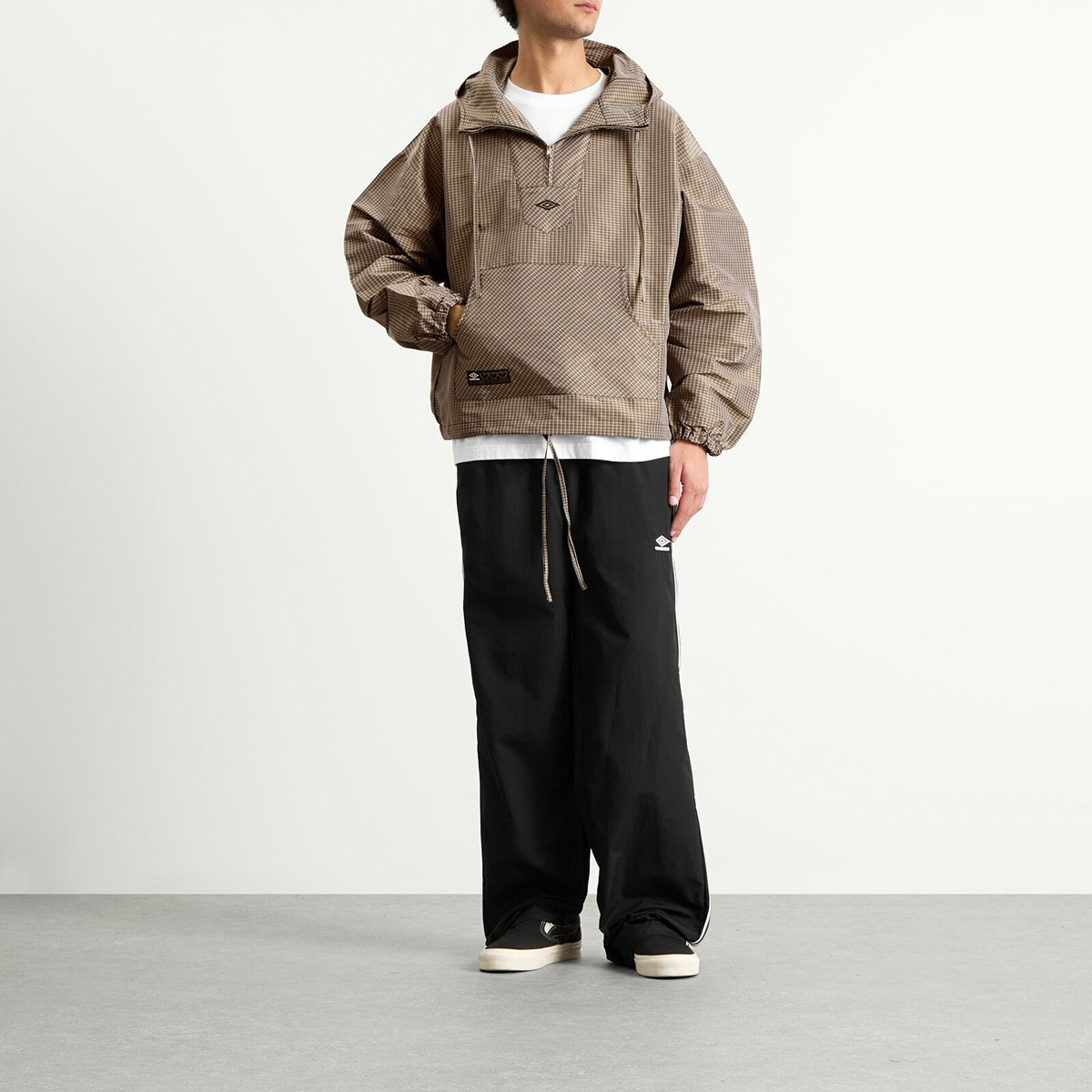 Umbro by Slam Jam Men's Masked Check Anorak in Beige Black Umbro