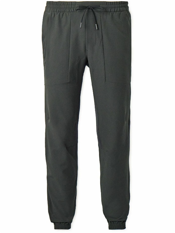 Photo: Lululemon - License to Train Slim-Fit Tapered Stretch Recycled-Shell Track Pants - Gray