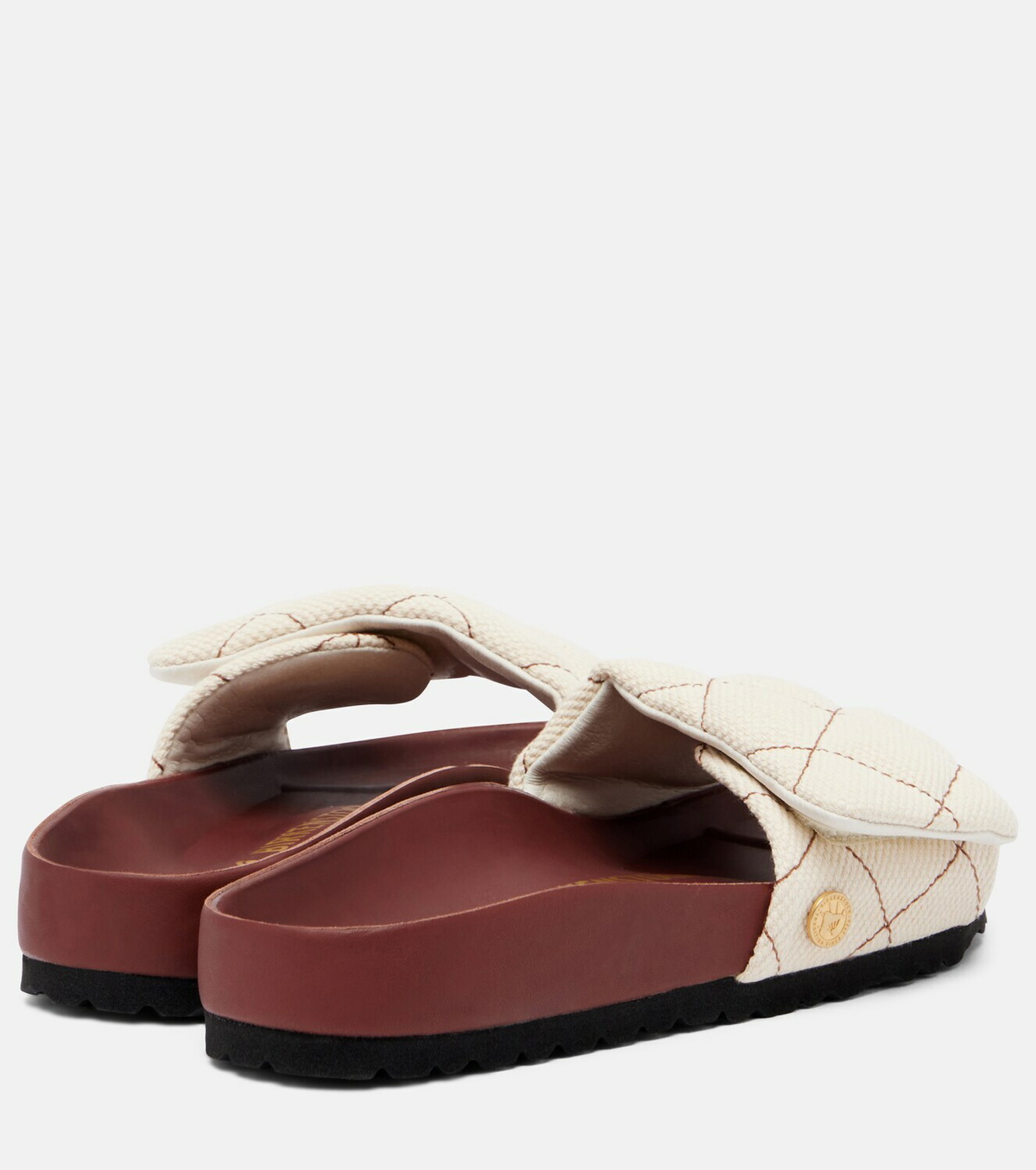 Birkenstock 1774 Sylt leather-trimmed quilted canvas slides